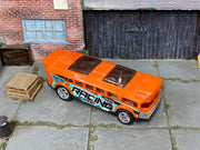Custom Hot Wheels Hot Wheels High – Orange HW Racing Academy – Chrome Wheels – Rubber Tires – three-quarter view