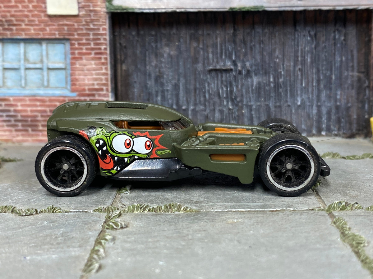 Custom Hot Wheels HW50 Concept – Olive/Orange – Black Wheels – Rubber Tires – side view