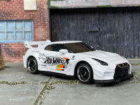 Custom Hot Wheels LB Silhouette Works GT Nissan 35GT-RR in white with black and chrome 6-spoke wheels and rubber tires