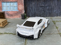 Custom Hot Wheels LB Silhouette Works GT Nissan 35GT-RR in white with black and chrome 6-spoke wheels and rubber tires