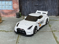 Custom Hot Wheels LB Silhouette Works GT Nissan 35GT-RR in white with black and chrome 6-spoke wheels and rubber tires