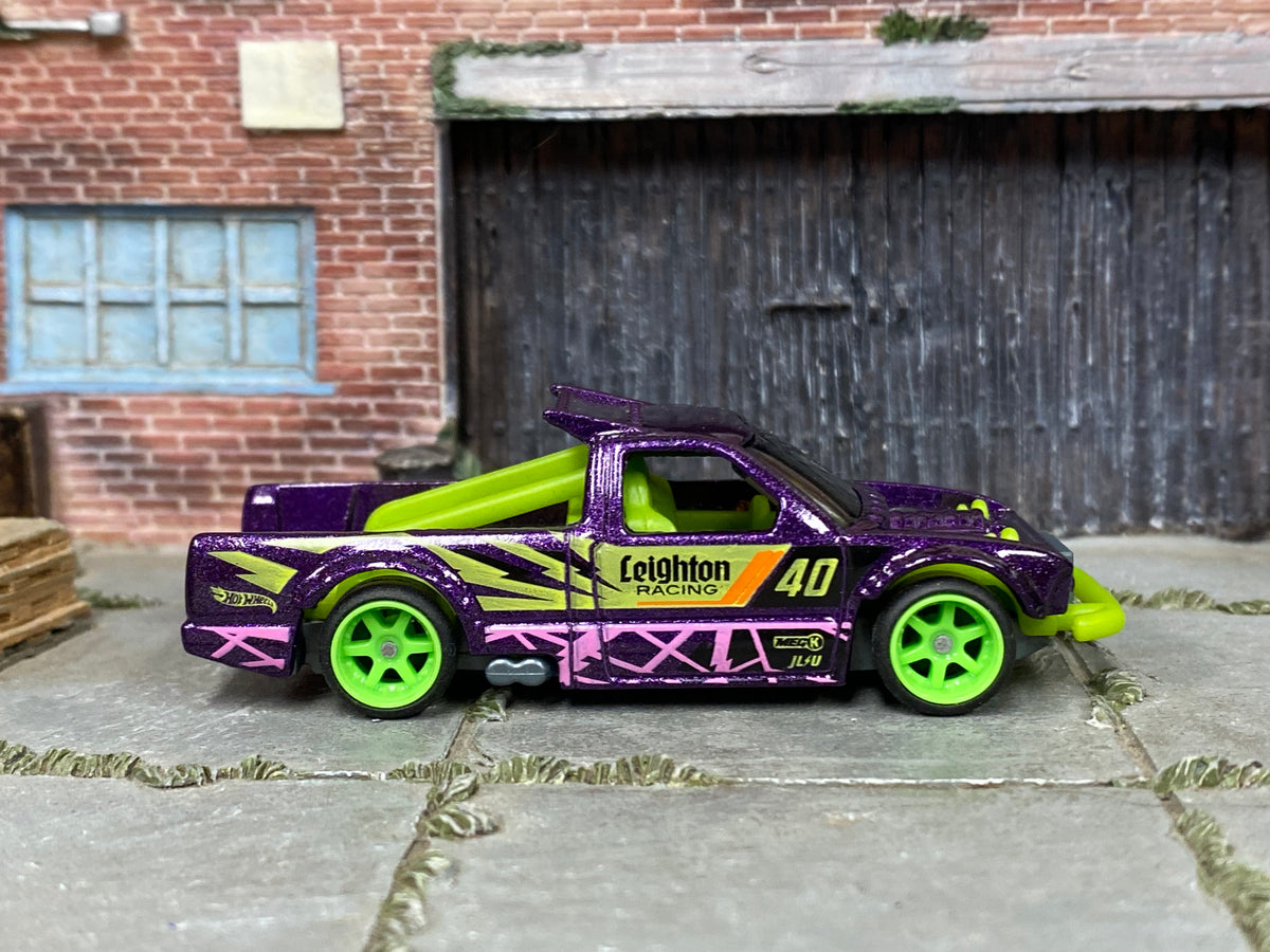 Custom Hot Wheels Limited Grip metallic purple Leighton Racing #40 livery with neon green accents with neon green wheels and rubber tires - side view