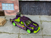 Custom Hot Wheels Limited Grip metallic purple Leighton Racing #40 livery with neon green accents with neon green wheels and rubber tires - three-quarter view