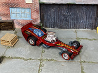 Madfast metallic-red custom Hot Wheels with chrome wheels and redline rubber tires, view 2