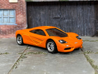 McLaren F1 custom Hot Wheels, front three-quarter view with chrome BBS-style wheels