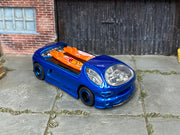 Custom Hot Wheels Monoposto – Metallic Blue/Orange – Black Wheels – Rubber Tires – three-quarter view