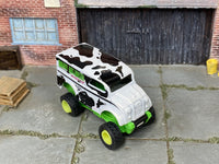 Monster Dairy Delivery cow-print custom Hot Wheels with green wheels and rubber tires, view 2