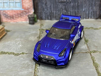 Satin-blue Nissan LB Works 35GT-RR custom Hot Wheels, front and wing view