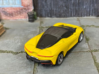 Satin-yellow Pininfarina Battista custom Hot Wheels, rear and roof view