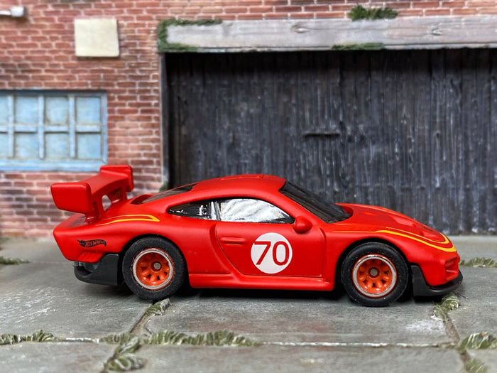 Satin-red Porsche 935 custom Hot Wheels number 70, side view