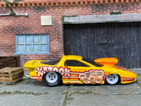 Custom Hot Wheels Pro Stock Pontiac Firebird in yellow KABOOM livery with white mag wheels and Hoosier drag slicks