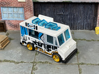Quick Bite Nite and Bite white-and-blue custom Hot Wheels with gold wheels and rubber tires, view 2