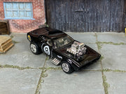 Custom Hot Wheels Rodger Dodger – Magic 8 Ball Black – Chrome Wheels – Rubber Tires – three-quarter view
