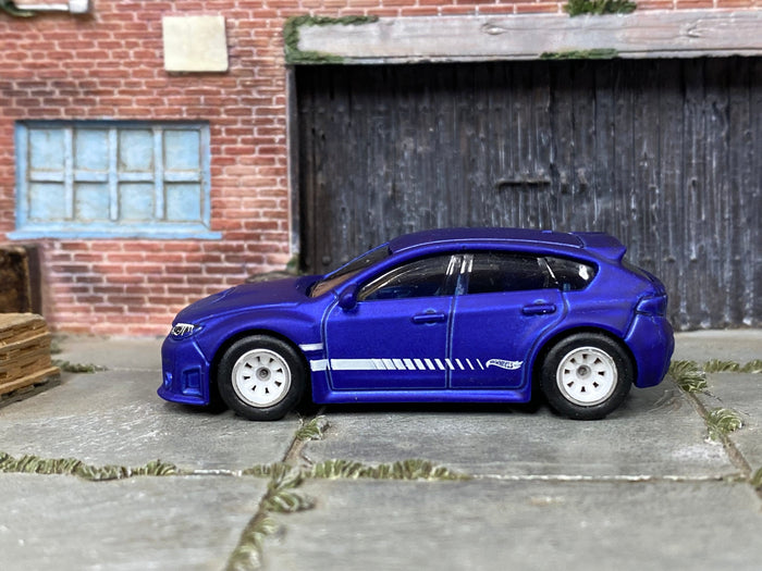 Satin-blue Subaru WRX STI custom Hot Wheels, left side view with white wheels