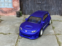 Subaru WRX STI custom Hot Wheels, elevated front view showing hood scoop