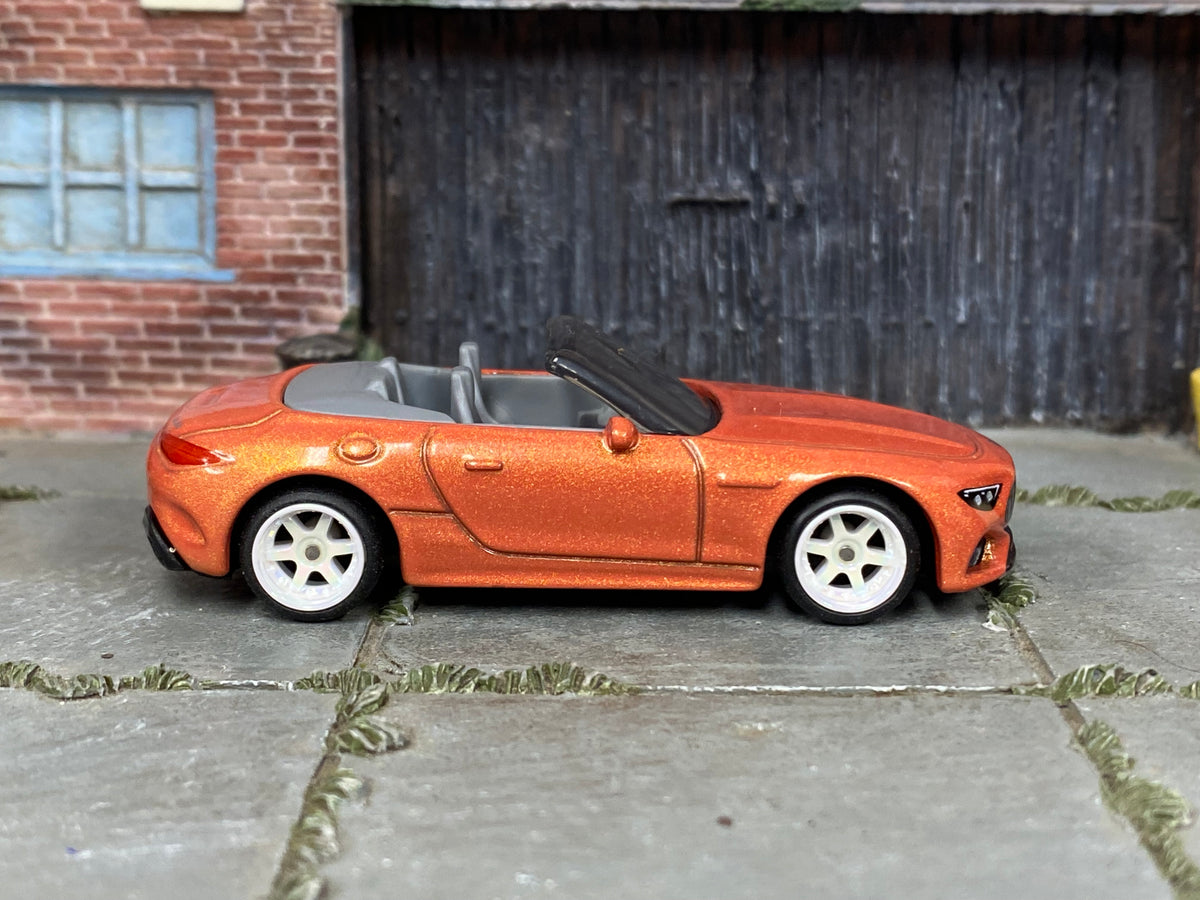 Custom Matchbox Mercedes-AMG SL 63, Metallic orange with white wheels, side view