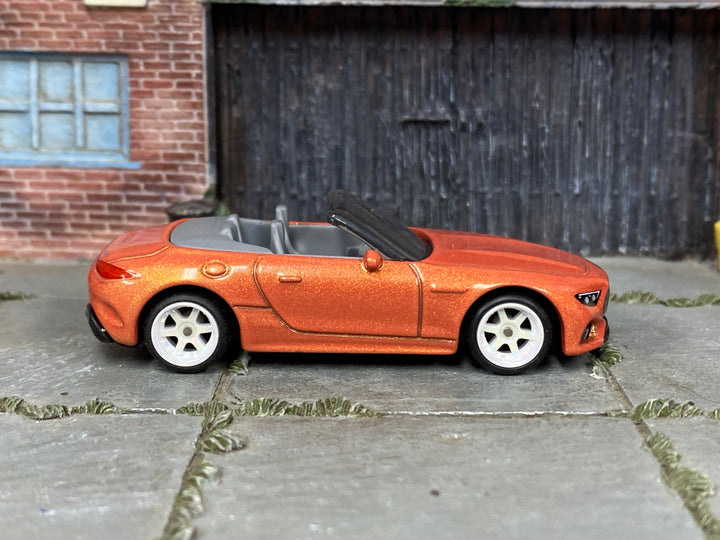 Custom Matchbox Mercedes-AMG SL 63, Metallic orange with white wheels, side view