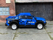Custom Matchbox 2019 Chevy Colorado ZR2, MBX Rally #15 with white wheels, side view
