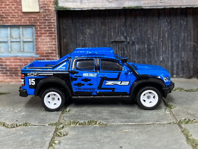 Custom Matchbox 2019 Chevy Colorado ZR2 – MBX Rally #15 with white wheels – Rubber Tires