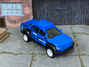 Custom Matchbox 2019 Chevy Colorado ZR2, MBX Rally #15 with white wheels, three-quarter view