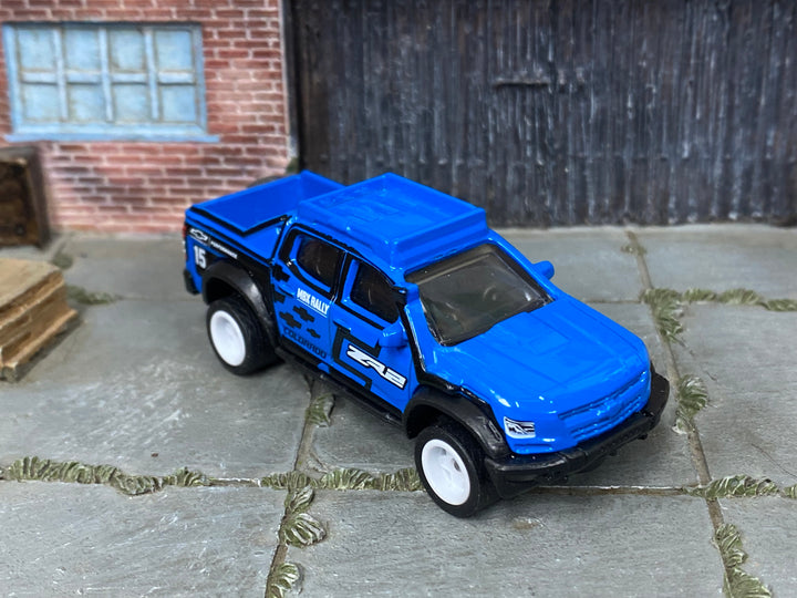 Custom Matchbox 2019 Chevy Colorado ZR2, MBX Rally #15 with white wheels, three-quarter view