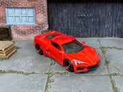Custom Matchbox 2020 Chevrolet Corvette C8, Red with black red-lip wheels, three-quarter view