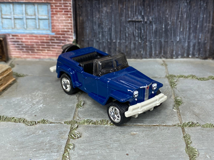 Custom Matchbox 1948 Willys Jeepster, Blue with chrome wheels, three-quarter view