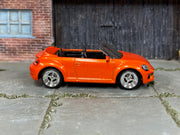 Custom Matchbox 2019 Volkswagen Beetle Convertible, Orange with chrome wheels, side view