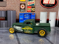 Satin-green Ford hot rod pickup custom Matchbox, right side with Construction Co. graphics