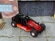 Custom Matchbox Dune Buggy, Beach Patrol with red off-road wheels, three-quarter view