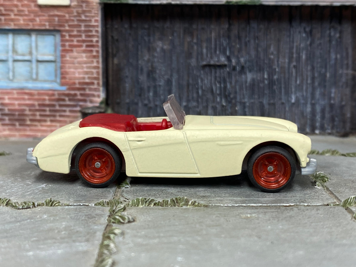 Custom Matchbox 1963 Austin-Healey Roadster, Cream with red wheels, side view