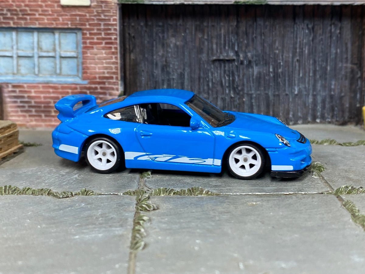 Custom Matchbox Porsche 911 GT3, Blue and white with white wheels, side view