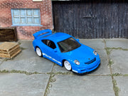 Custom Matchbox Porsche 911 GT3, Blue and white with white wheels, three-quarter view