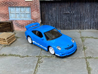 Porsche 911 GT3 blue-and-white custom Matchbox with white wheels, view 2