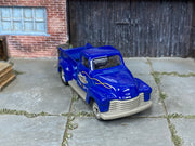 Custom Matchbox 1947½ Chevy AD Truck, Jimmy C's Saddlery with chrome wheels, three-quarter view