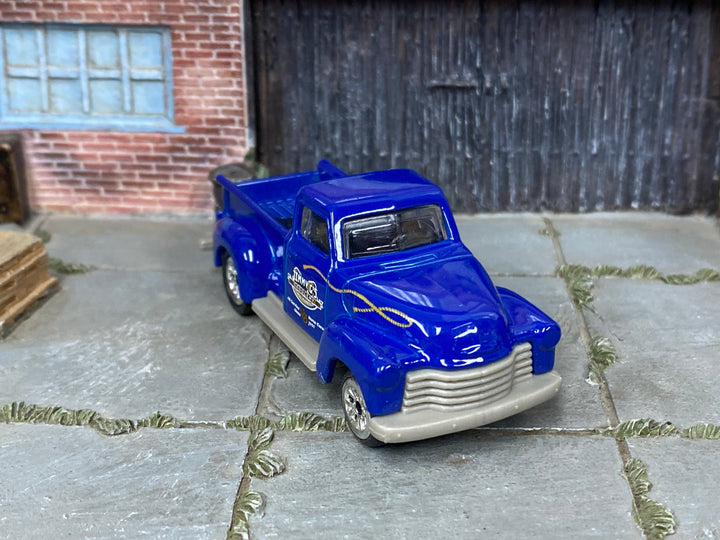 Custom Matchbox 1947½ Chevy AD Truck, Jimmy C's Saddlery with chrome wheels, three-quarter view