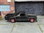 Custom Matchbox 1970 Chevrolet El Camino SS, Black and silver with red wheels, side view