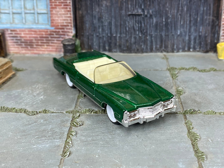 Custom Matchbox 1961 Lincoln Continental, Metallic green with white wheels, three-quarter view