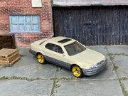 Custom Matchbox 1994 Lexus LS 400, Champagne with gold wheels, three-quarter view