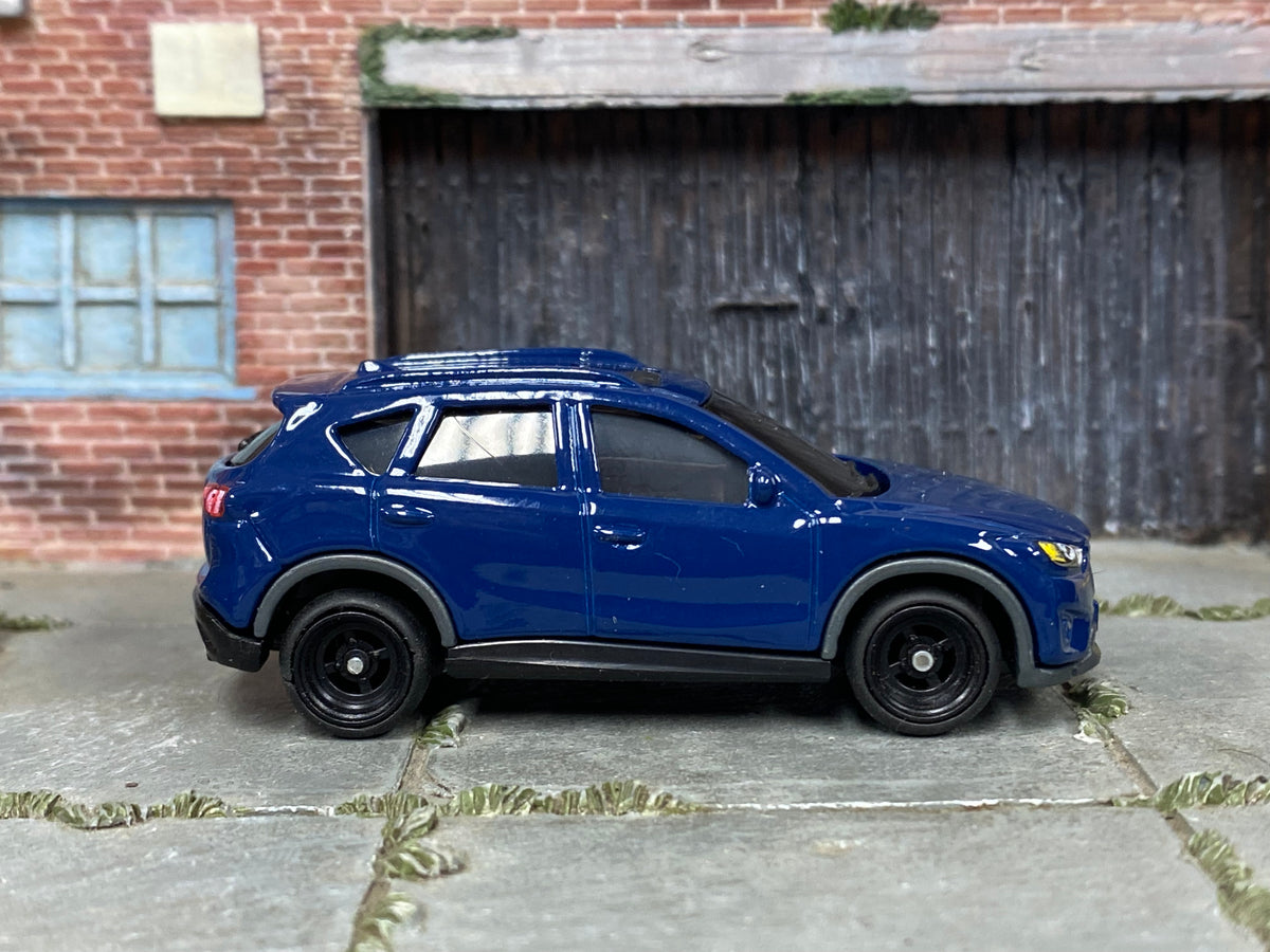 Custom Matchbox 2016 Mazda CX-5, Blue with black wheels, side view