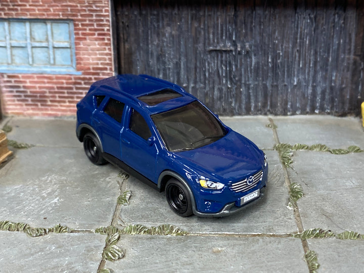 Custom Matchbox 2016 Mazda CX-5, Blue with black wheels, three-quarter view