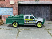 Custom Matchbox Ford F-550 Super Duty, BLM Research with lime green wheels, side view