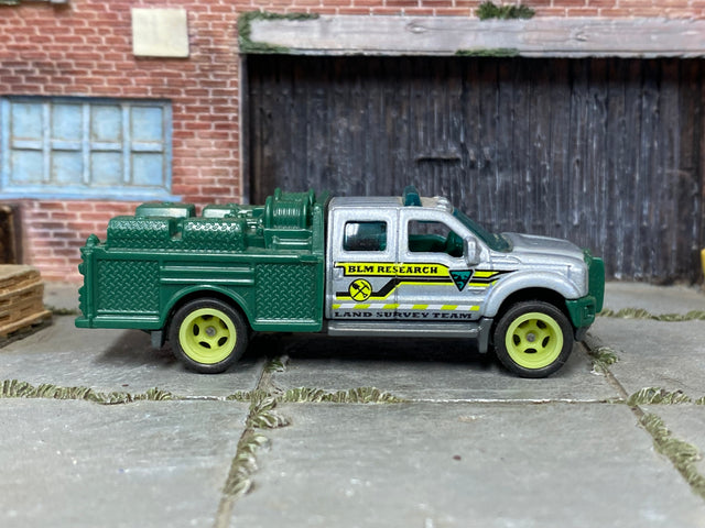 Custom Matchbox Ford F-550 Super Duty – BLM Research with lime green wheels – Rubber Tires