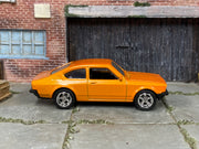 Custom Matchbox Volkswagen Golf GTI Mk1, Metallic orange with chrome wheels, side view