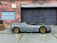 Dry-fitted bare-metal 2017 Pagani Huayra custom kit, side view