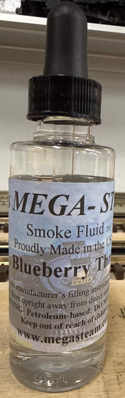 JT's Mega-Steam 143 Blueberry Thrill Smoke Fluid 2 oz actual labeled glass bottle photograph 2
