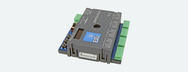 ESU 51830 SwitchPilot 3 accessory decoder with OLED display and connection terminals.