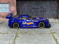 Hot Wheels '16 Mercedes-AMG GT3 blue 71, right side view with yellow-rim wheels