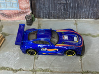 Hot Wheels '16 Mercedes-AMG GT3 blue 71, top view with yellow-rim wheels
