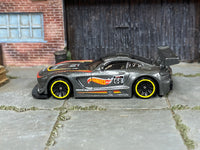 Hot Wheels '16 Mercedes-AMG GT3 metallic dark gray number 68, left side view